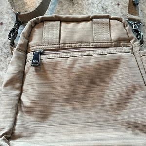 lug crossbody purse. Tan and hardly used. Awesome condition! Great for vacation